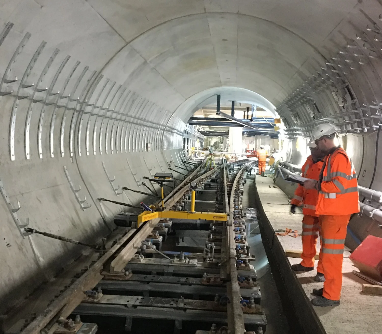 OSL engineers working on track in a tunnel